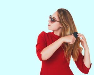 Naklejka premium Young pretty woman, sunglasses, white background 