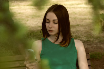 Young pretty girl, smartphone, outdoor  