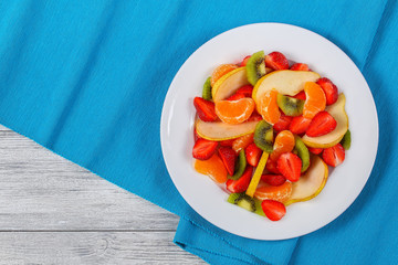 strawberry, kiwi fruit, pear, mandarin salad