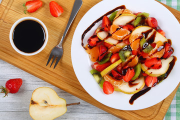 strawberry, kiwi fruit, pear, mandarin salad