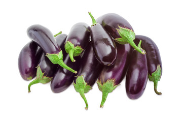 Fresh purple eggplants on a light background