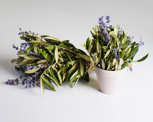 Romantic bouquet of Lavender flowers and Eucalyptus leaves in retro style on gray background. Shallow depth of field.