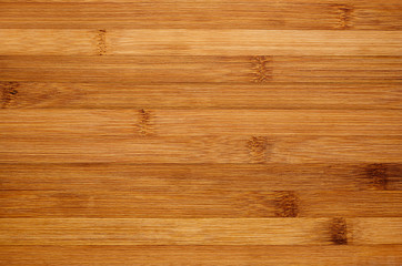 Obraz na płótnie Canvas Bamboo brown wood texture, horizontal plank, top view, closeup.
