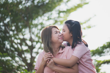 Asian mother and daughter in happines at the outside