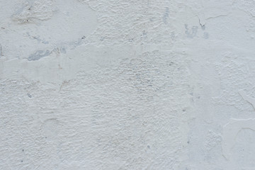 Wall fragment with scratches and cracks