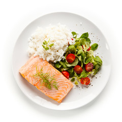 Roast salmon with white rice on white background