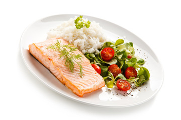 Roast salmon with white rice on white background