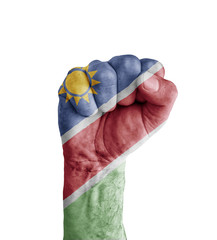 Flag of Namibia painted on human fist like victory symbol