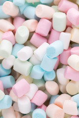 Background or texture of colorful mini marshmallows.