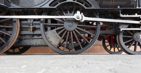 Fototapeta na wymiar Steam locomotive wheels or steam train wheels