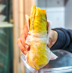 Shawarma as best street food in man hand