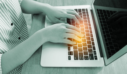 Woman office worker is typing keyboard, hacker or security network concept