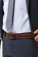 close up of man in a suit with tie and handkerchief