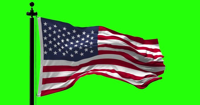Close up USA flag blowing in the wind on green, looped slowmotion, 4K