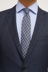 close up of man in a suit with tie and handkerchief