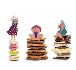 fat women on piles of sweets