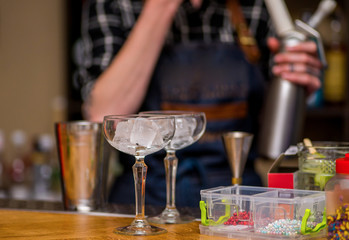 Bartender prepares a cocktail