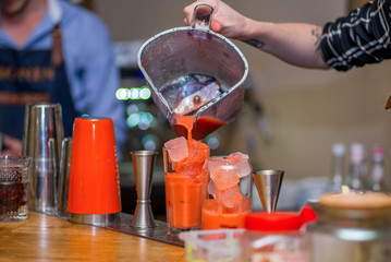 Bartender prepares a cocktail