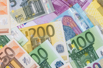 20 50 100 200 500 euros bills as background.