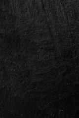 Dark grey black slate background or texture.