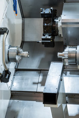 Modern lathe metalworking CNC machine.