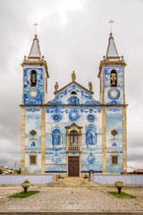 Fototapeta na wymiar Facade of Santa Marinha church decorated with azulejo, Cortegaca