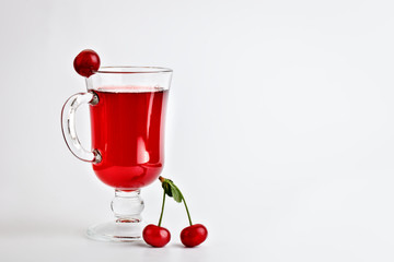 Delicious cherry juice and ripe cherries.