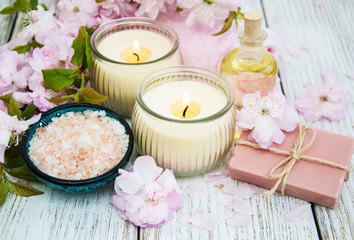 Fototapeta na wymiar Spa products with sakura blossom