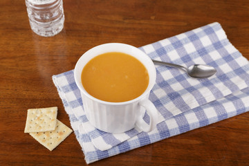 Bean Soup in Mug with crackers