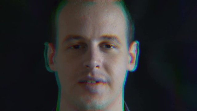 Face of a smiling man, a distorted random characters. Concept: a glitch in the matrix. glitch chromatic aberration.