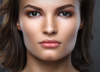 Obraz premium Close up portrait of beautiful woman face