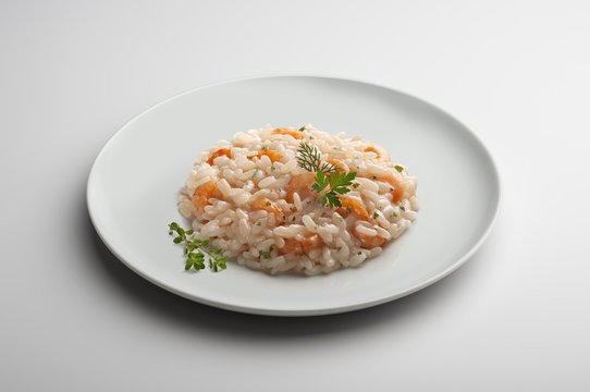 Risotto dish with shrimp and aromatic herbs