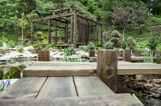 Wooden pergola in japanese garden