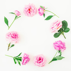 Frame of pink flowers, roses and peony on white background. Floral composition. Flat lay, top view.