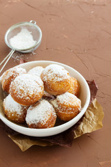 Donuts In powdered sugar.