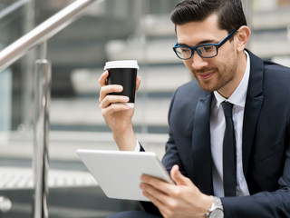 Portrait of handsome businessman outdoor