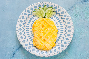 Breakfast for kids - omelette look like pineapple