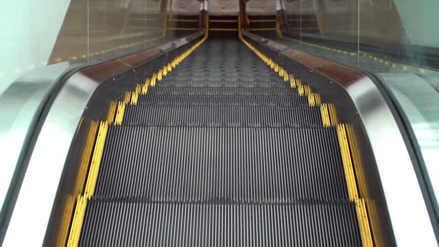 Moving escalator up and down, mecanic, electic, Stair and escalators in a public area