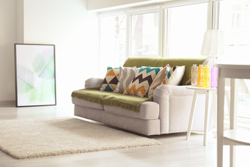 Modern living room with grey couch