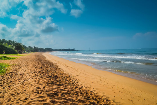 Beautiful Induruwa Beach Sri Lanka with blue water