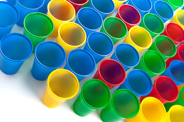 Multicolor plastic glasses isolated on white background