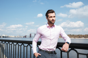 Fototapeta premium Portrait of young confident man in suit