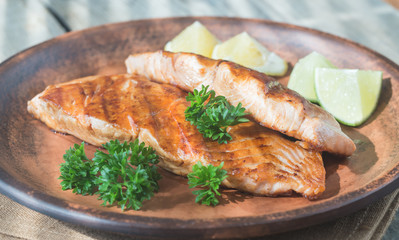 Roasted salmon steak with fresh parsley