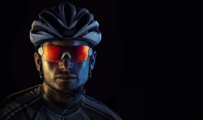 Gordijnen Cyclist. Dramatic close-up portrait © vitaliy_melnik