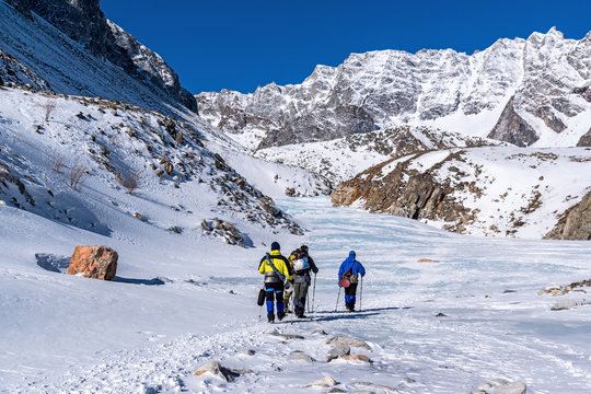 A group of tourists goes to climb Munku-Sardyk mount