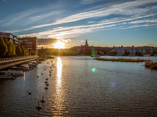 Sunset view of lake in Hammarby Sjöstad and Södermalm in Stockholm, Sweden