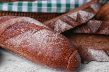 Delicious rye bread on table, closeup