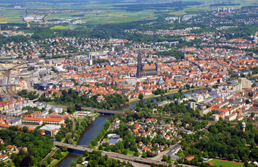 Fototapeta na wymiar Closer Aerial view of Ulm Minster (Ulmer Münster) and Ulm, south germany on a sunny summer day