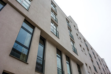 Obraz premium modern office building in low angle view with futuristic architecture