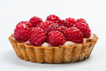 Fresh Homemade Fruit Tart with raspberry isolated on white table.
